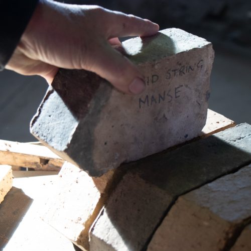 Checking hand made bricks